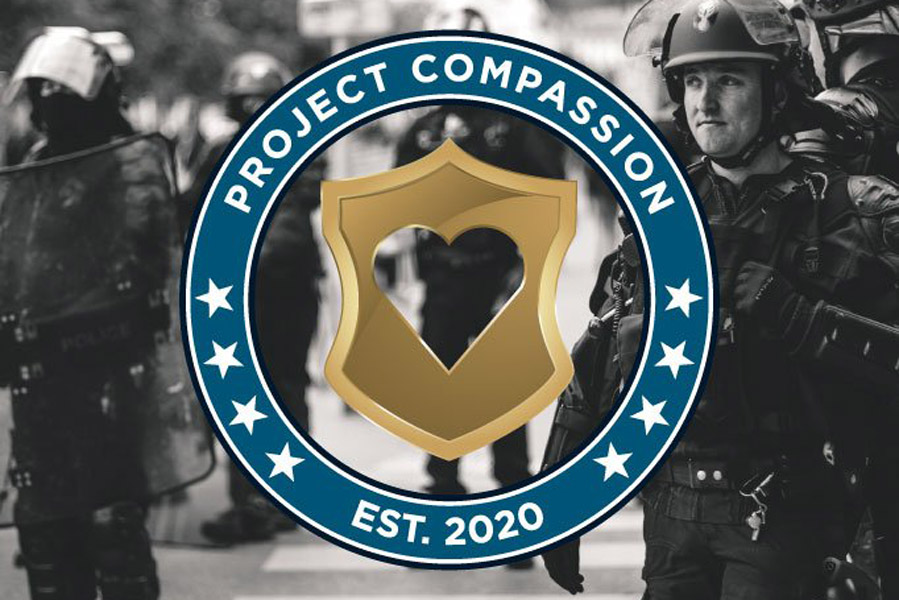 Black and white photo of police officers with the Project Compassion Logo over it.