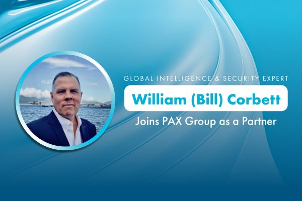 Header image with blue wavy background and a circular profile picture of Bill Corbett. Copy reads "Global Intelligence and security expert William (Bill) Corbett Joins PAX Group as a Partner."